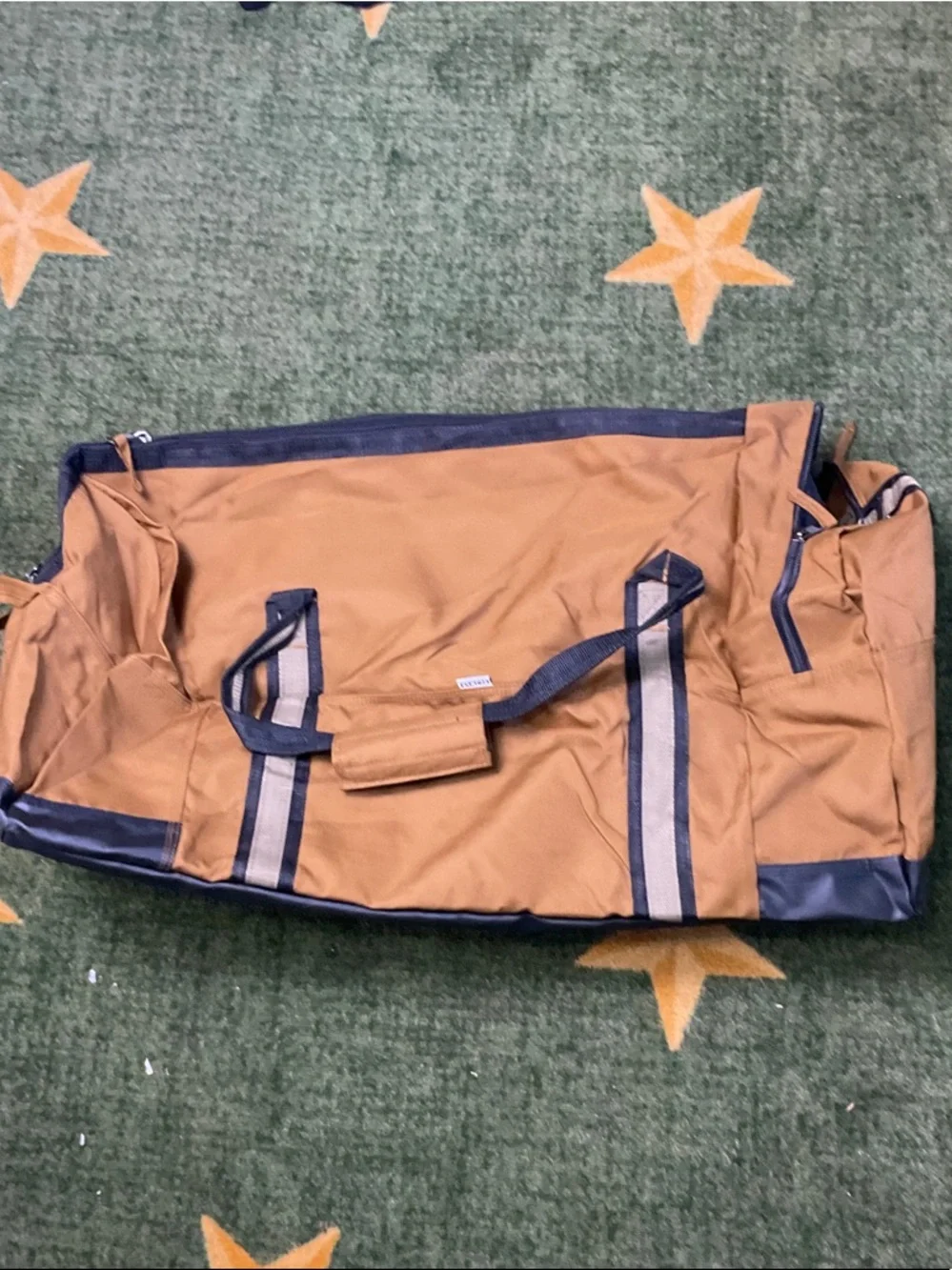 NRA SYMBOL Tan Canvas Duffel Bag with Navy Black Trim and Shoulder Strap